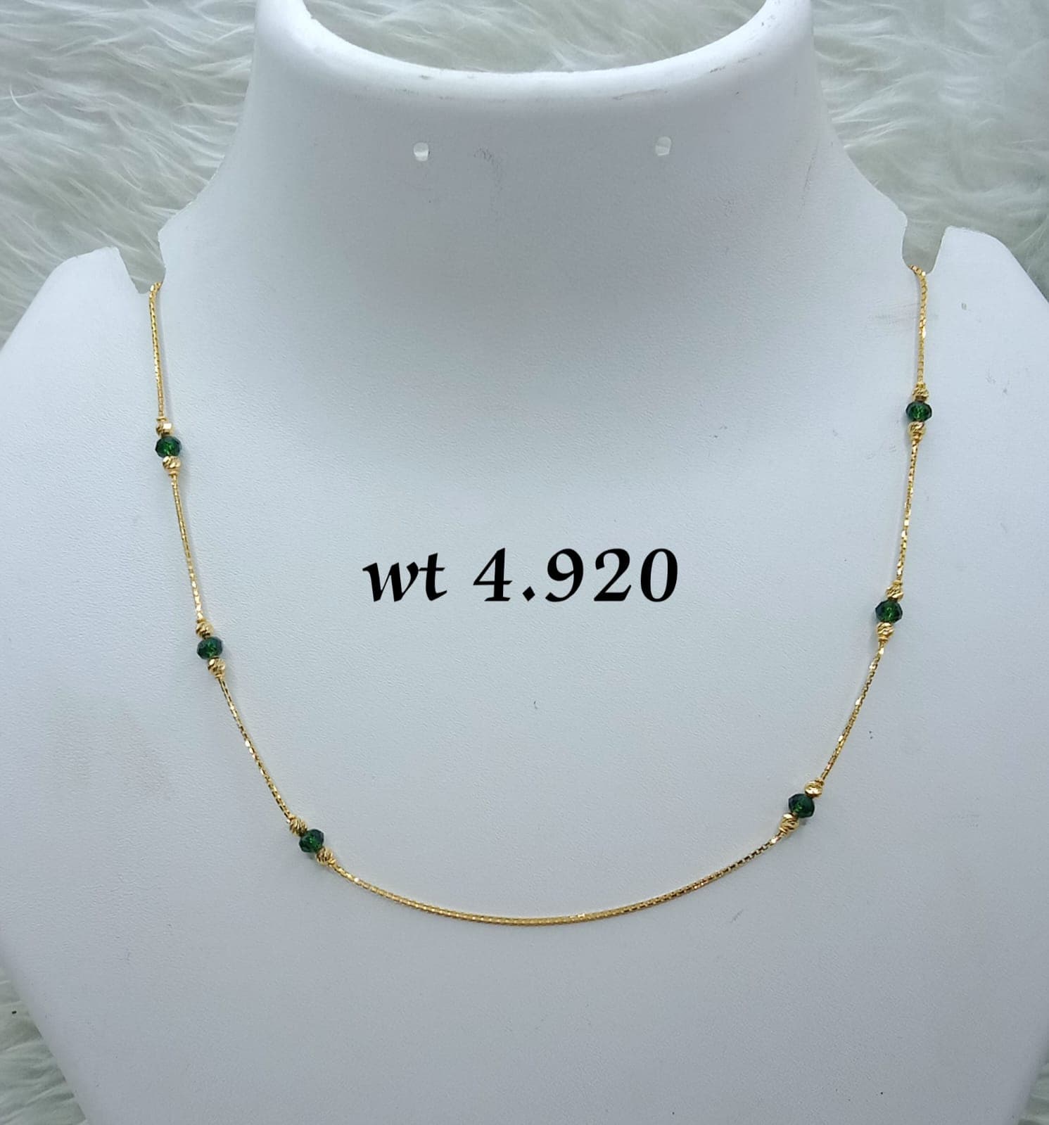 Elegant Gold Chain with Emerald Beads