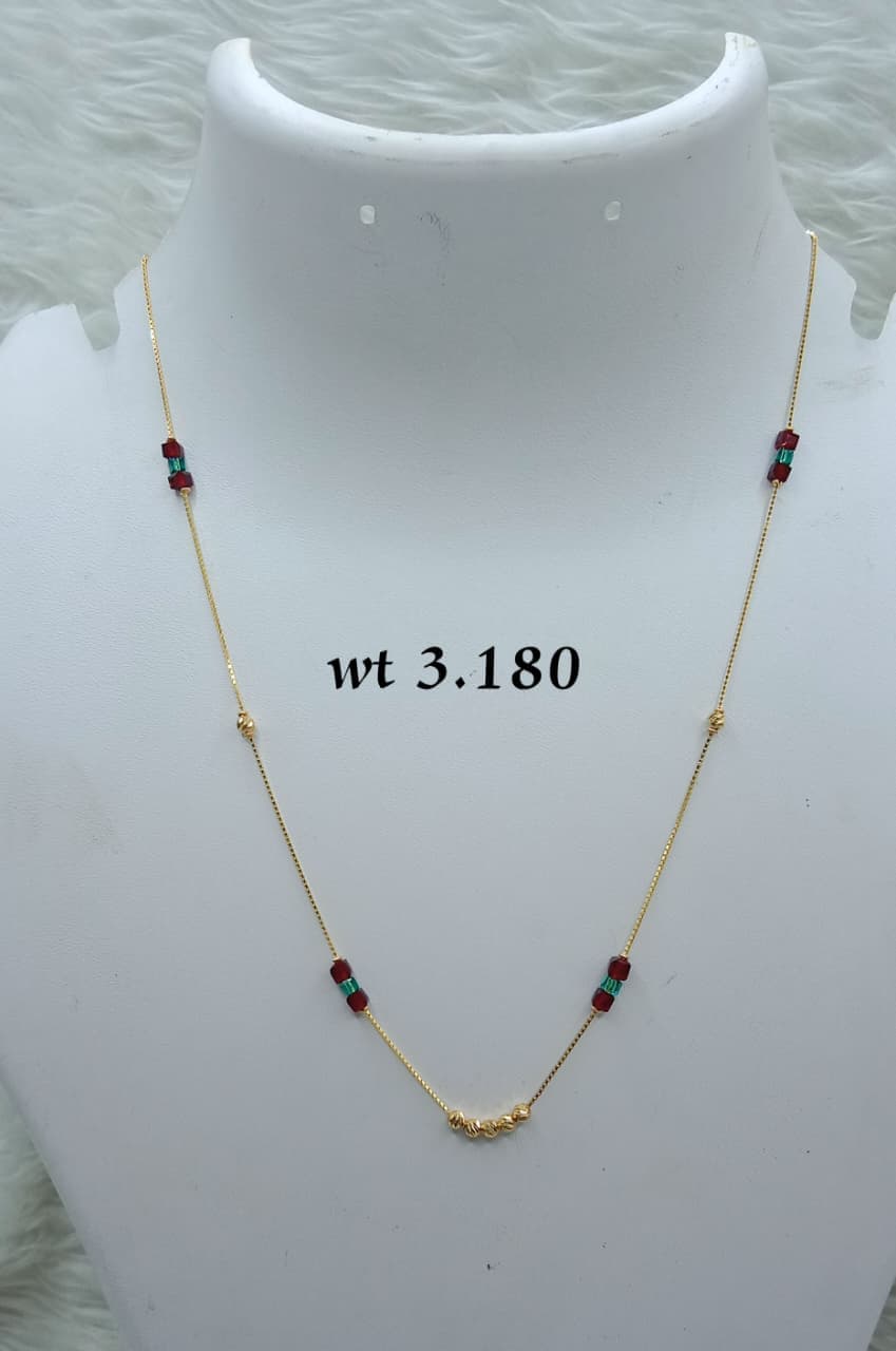 Delicate Gold Chain with Red Bead Accents